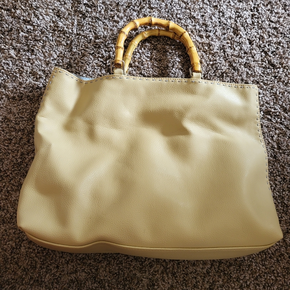 Tan purse with bamboo handles